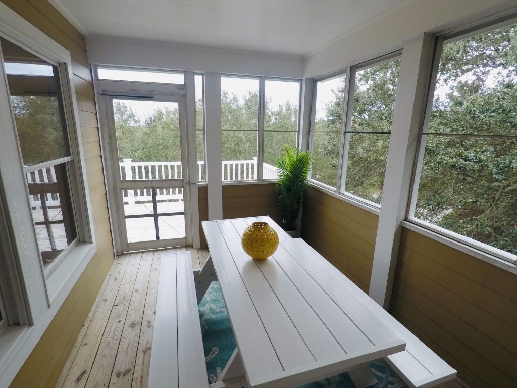 The screened porch.